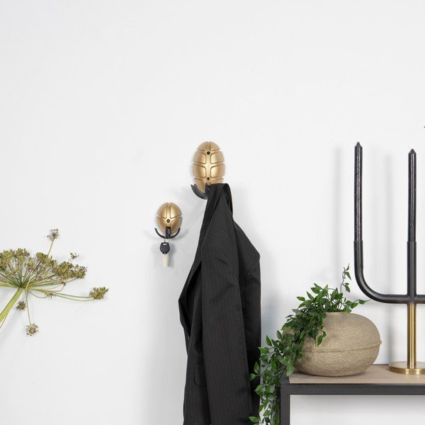 Gancio da parete nero/dorato in plastica Tick – Spinder Design-image-1