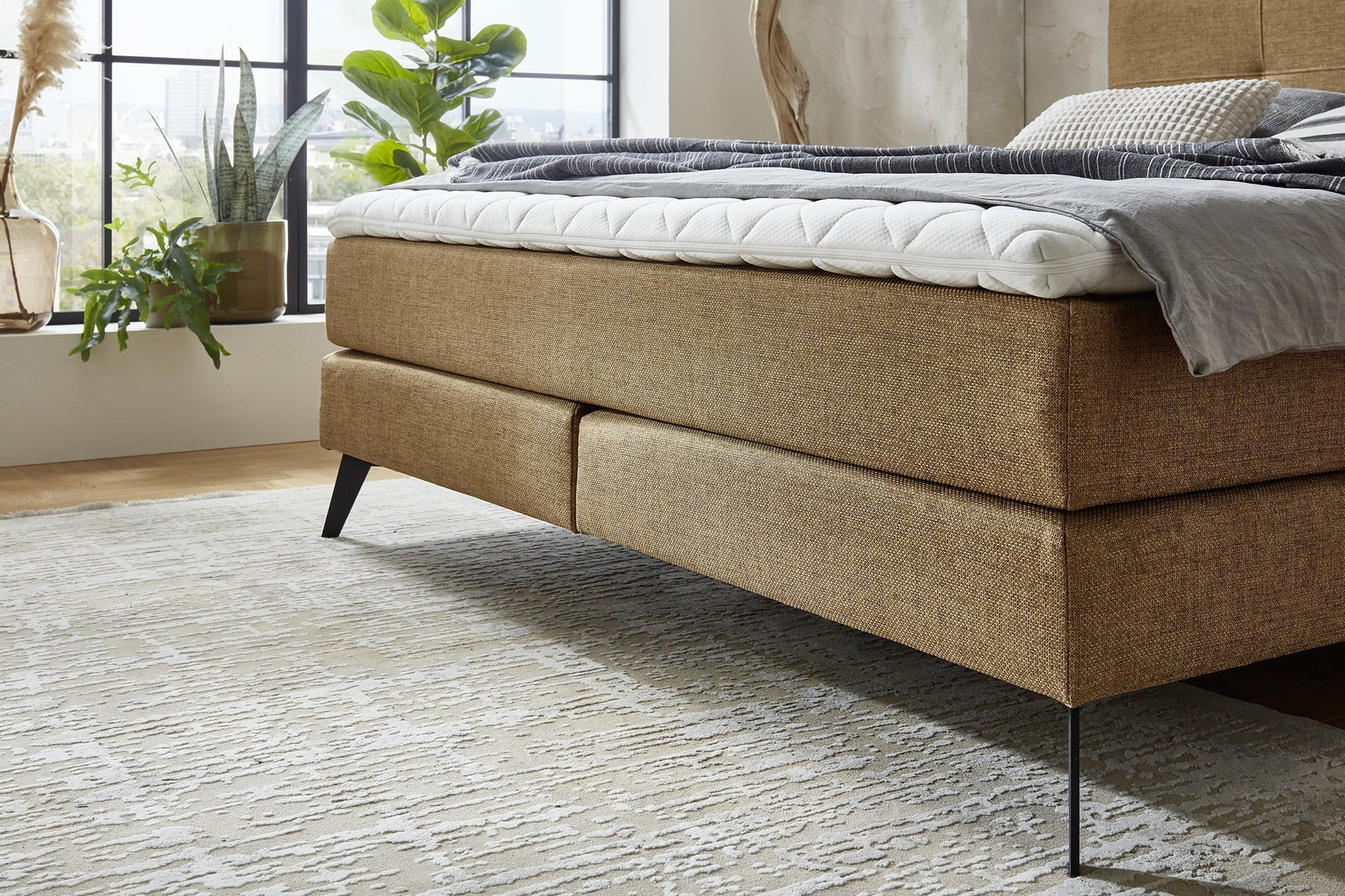 I letti boxspring sono disponibili in molti design e colori.